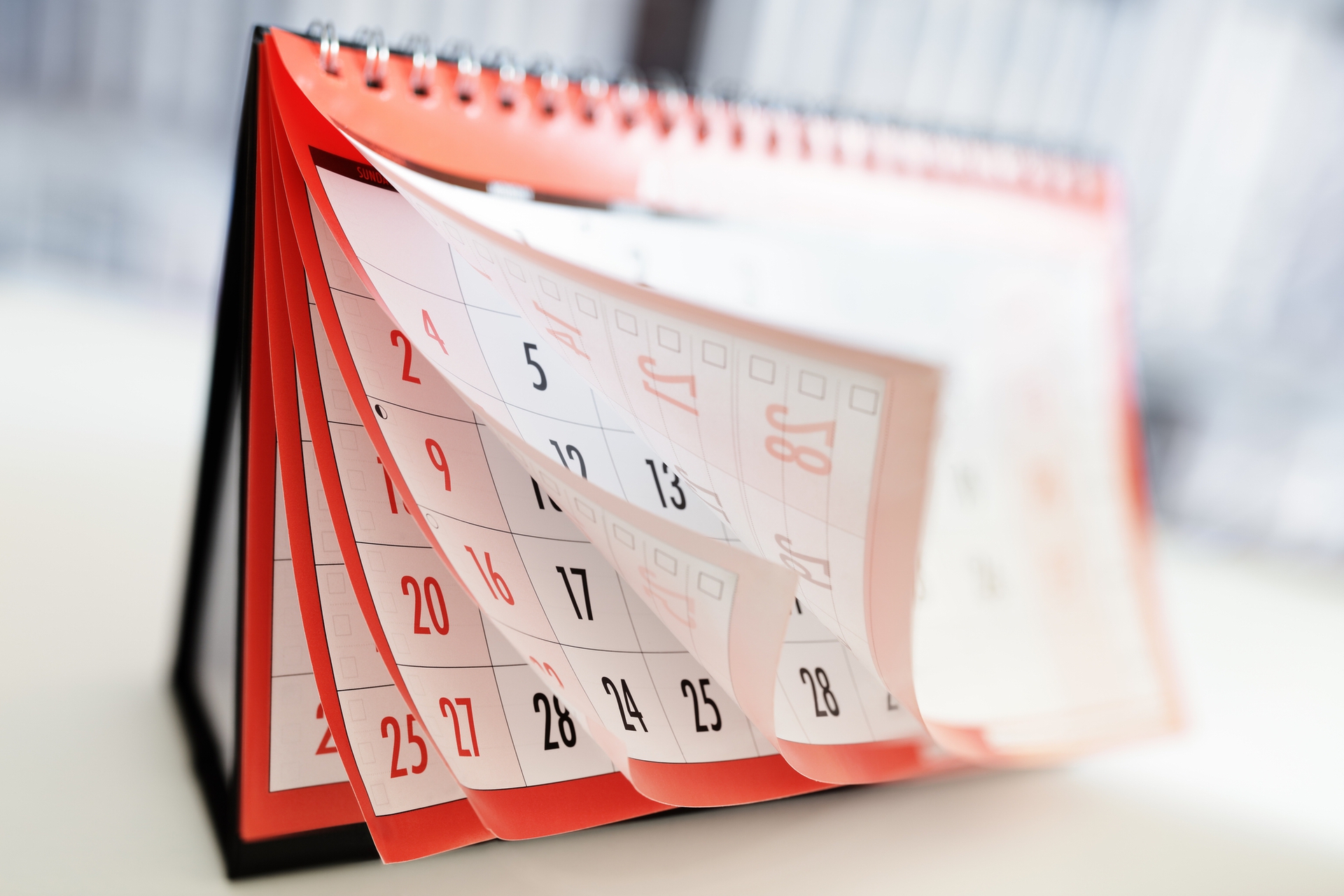calendar with pages turning in the breeze
